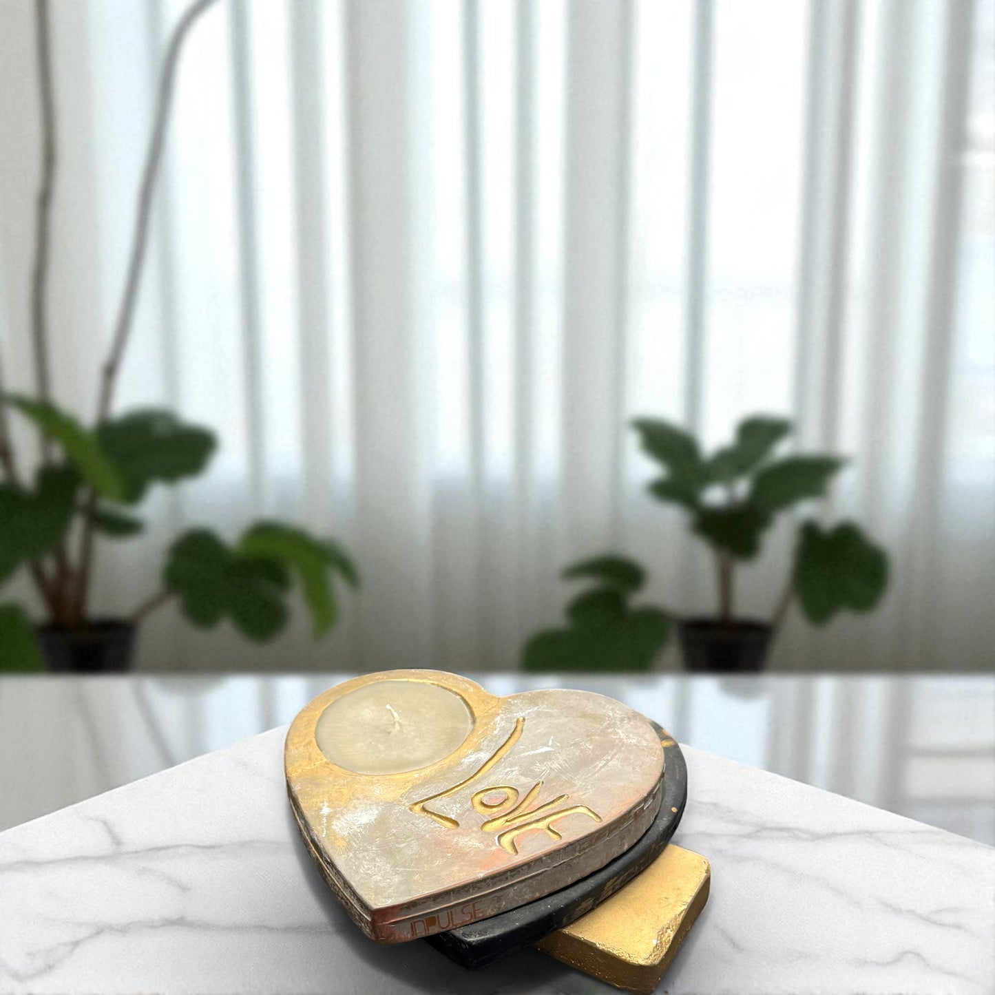 Heart-shaped object with 'LOVE'