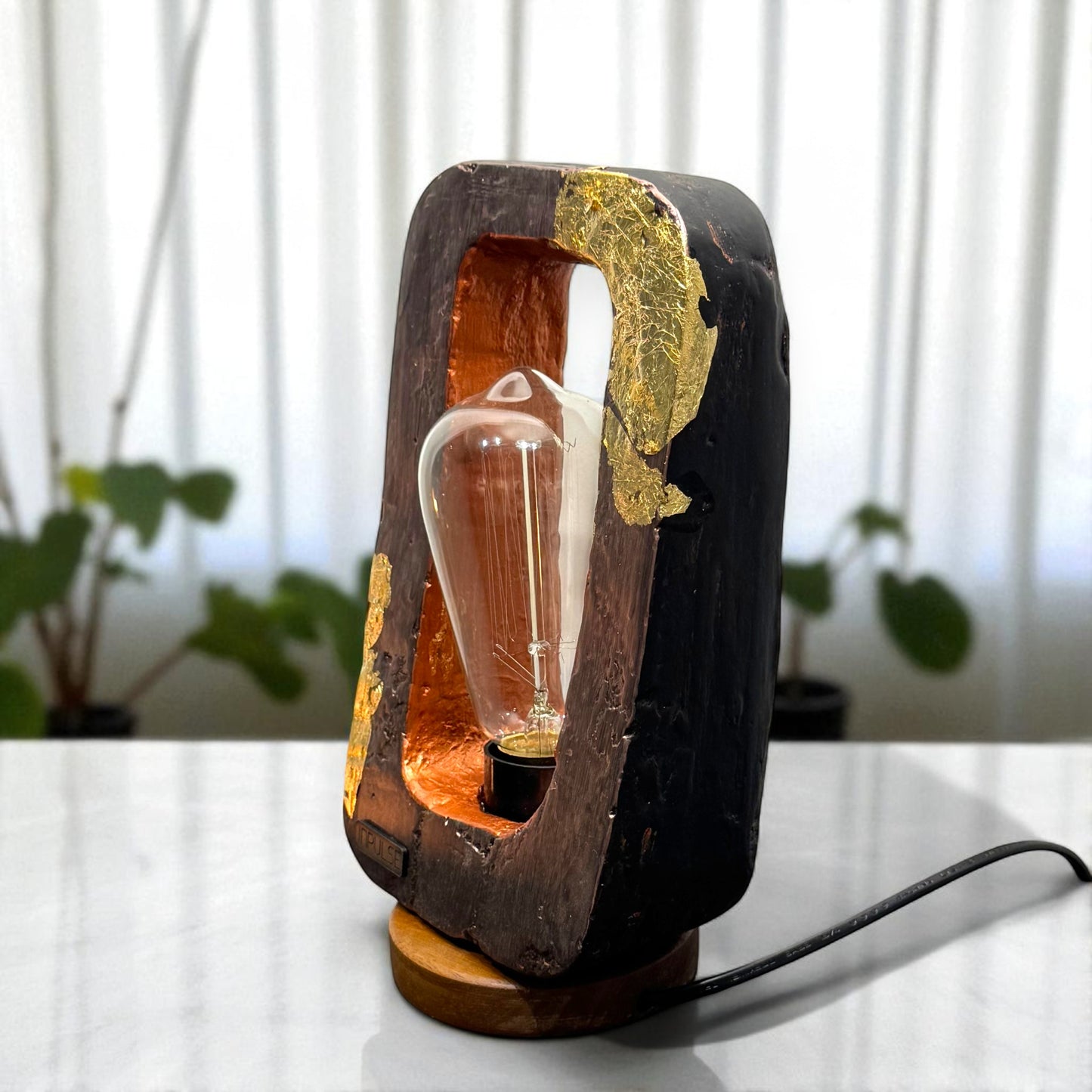 Table lamp with a unique design featuring a bulb inside