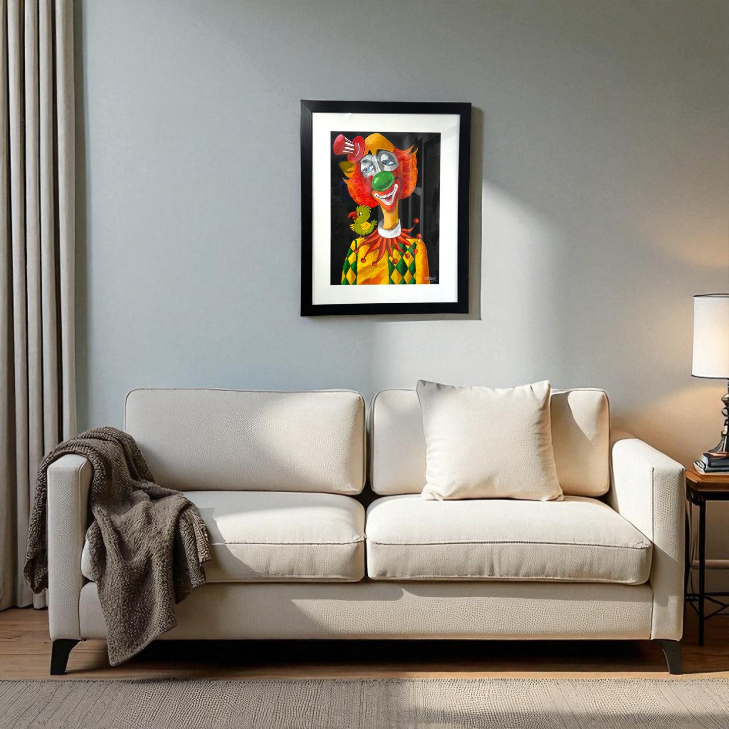 framed artwork of a red clown with birds