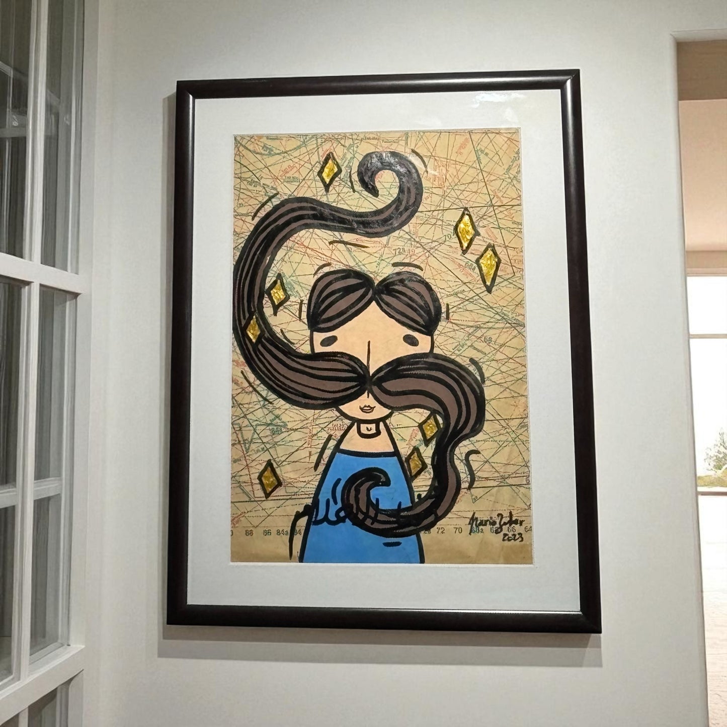 Framed artwork of a stylized character with long hair on a textured background.