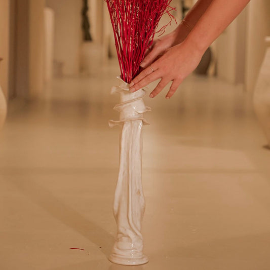 Decorative ceramic vase with a textured design 