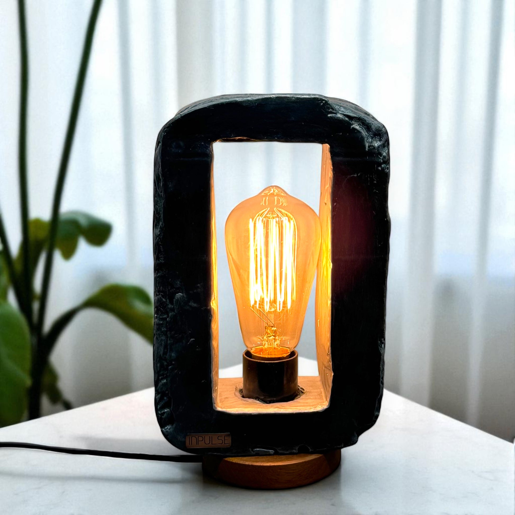 Rectangle table lamp with yellow bulb 