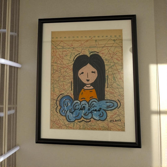 Framed illustration of a girl with a cloud on a map background