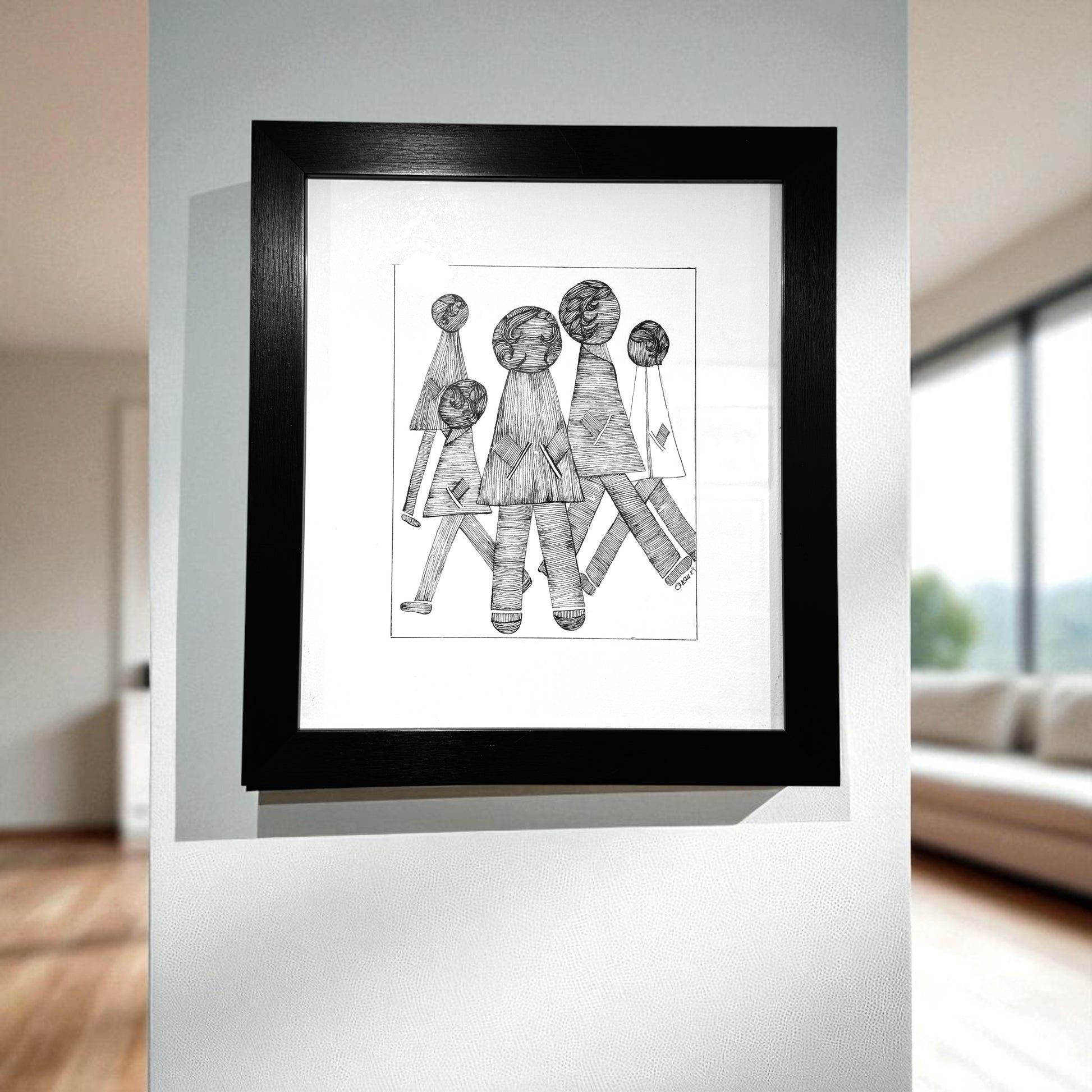 Framed black and white illustration of three abstract figures 