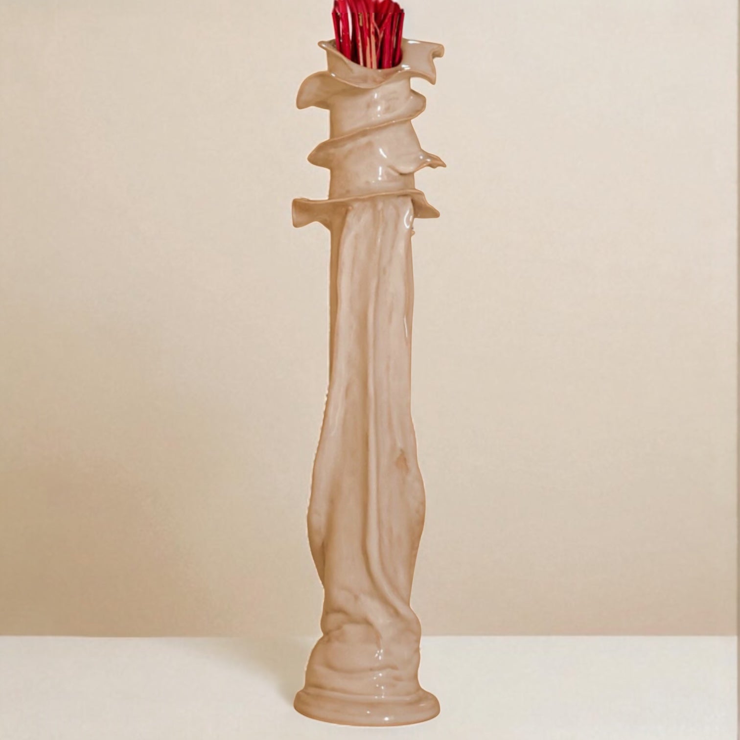 Decorative ceramic vase with a textured design 