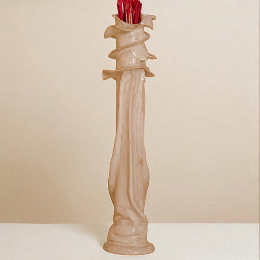 Decorative ceramic vase with a textured design 